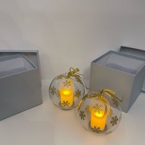 Set of 2 beautiful glass ornaments with battery operated candle inside